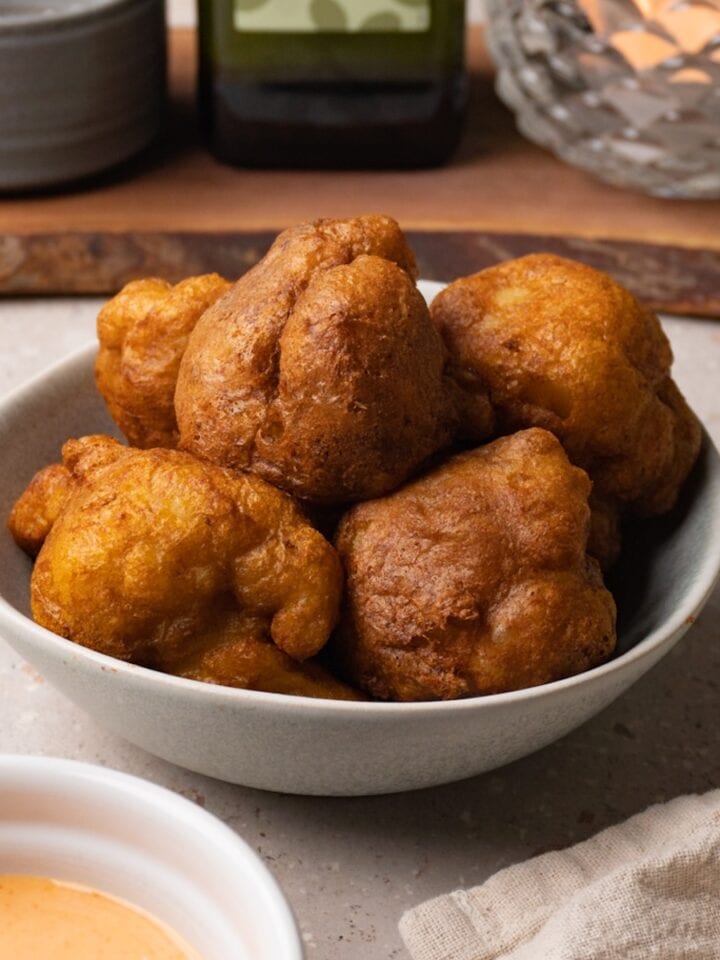 Deep-fried cauliflower bites in a serving bowl.
