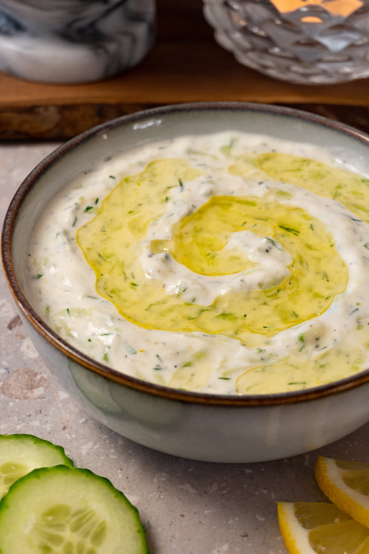 A bowl filled with tzatziki sauce.