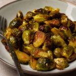 A bowl of baked Brussels sprouts.