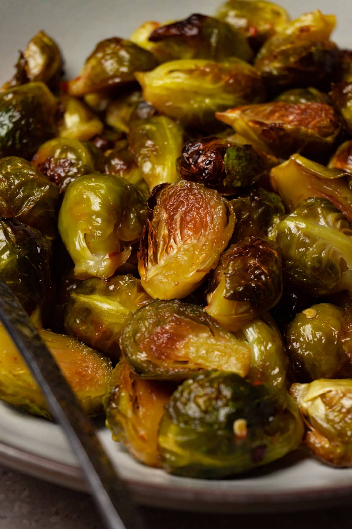 A bowl of baked Brussels sprouts.